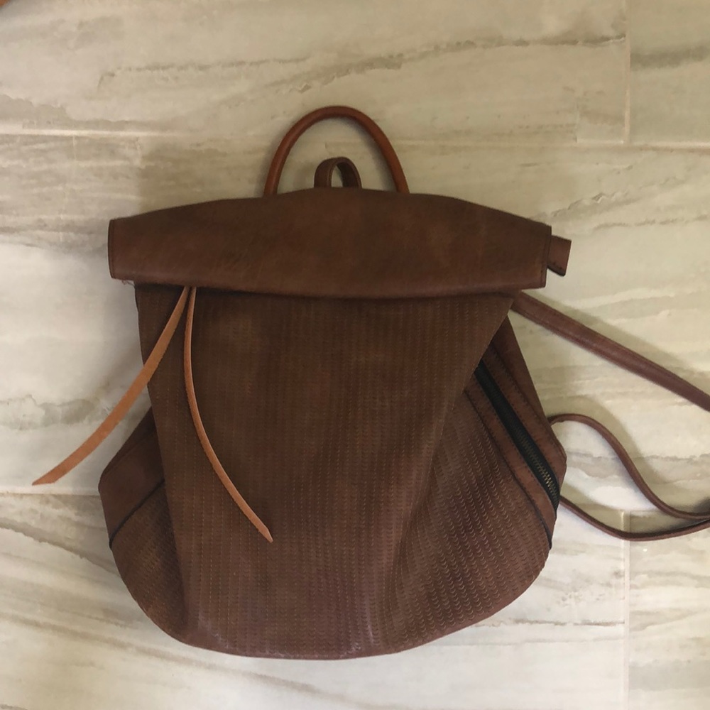 Faux leather backpack. Like new condition